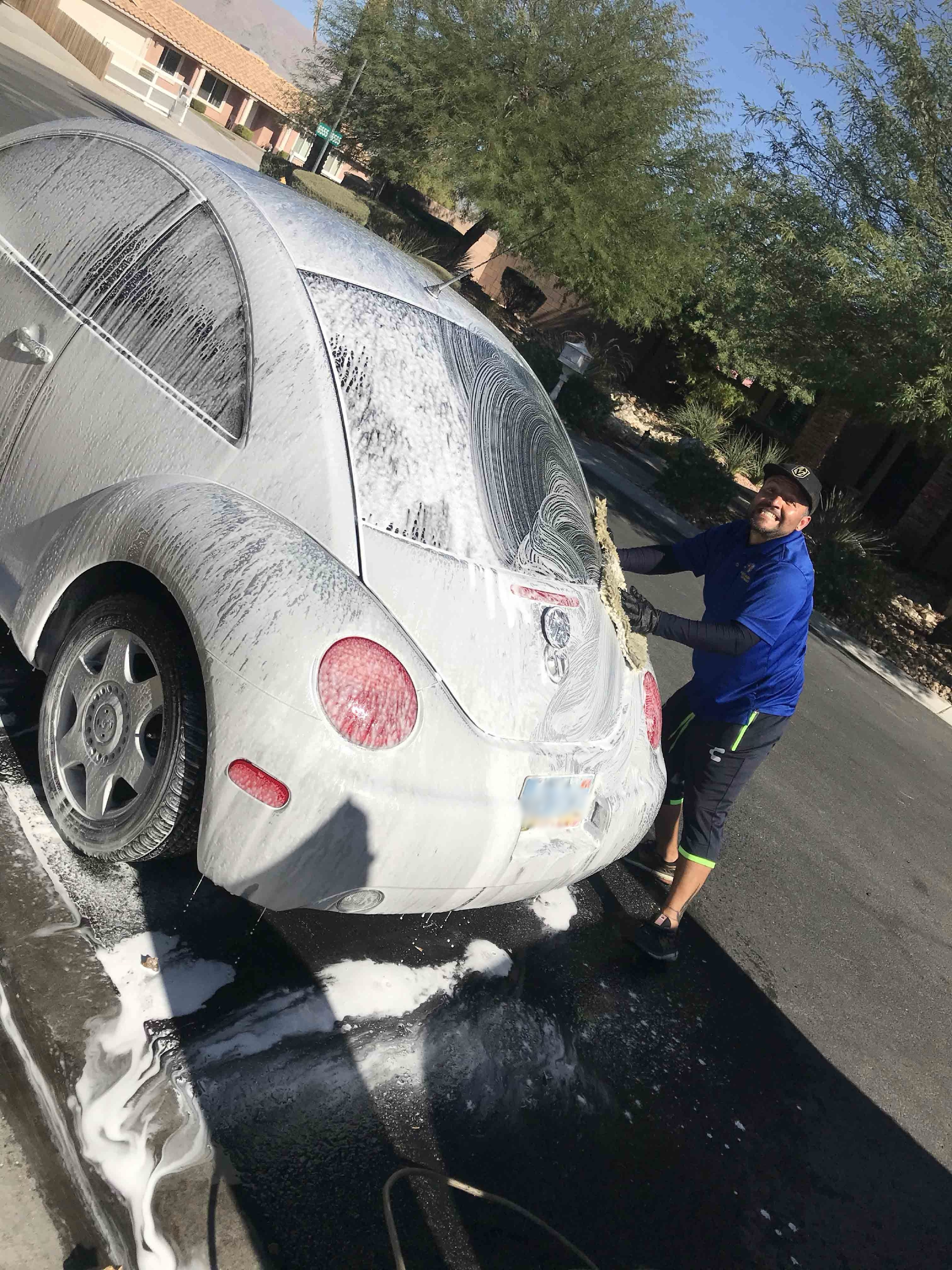 Vehicle receiving a mobile car wash